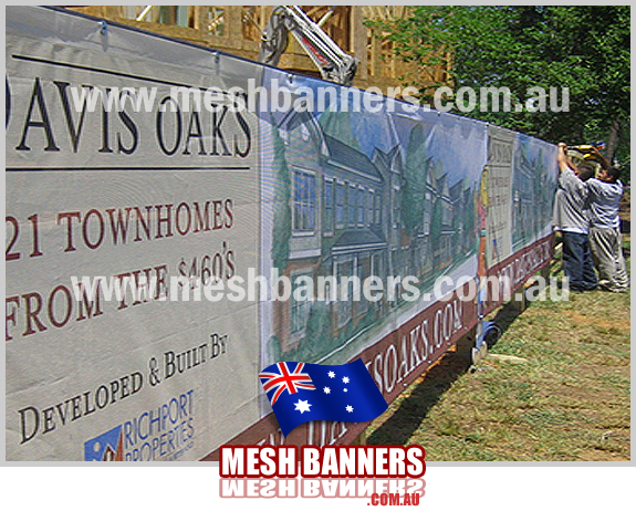 Installing the temporary fence sign with large washer overcaps